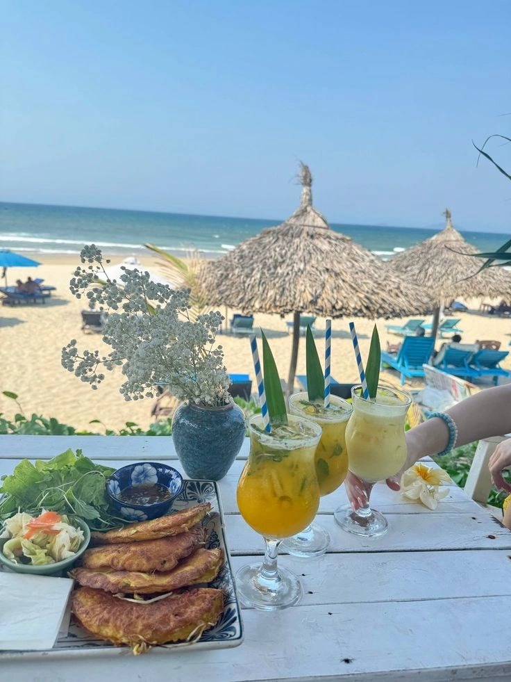 Sunbeds and umbrellas at An Bang Beach Hoi An