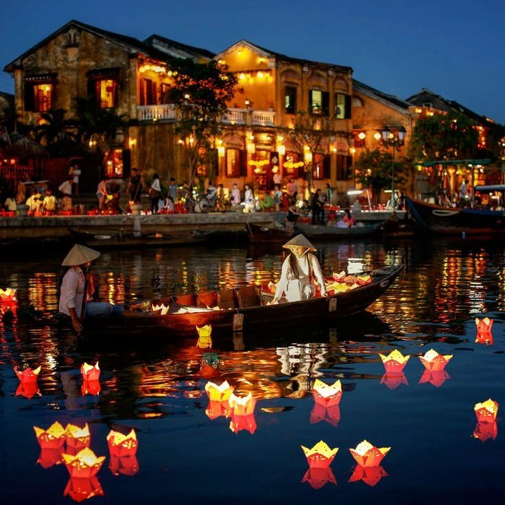 Lantern-lit boats on Thu Bon River Hoi An